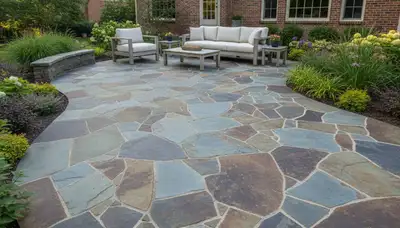Flagstone patio with natural slate pavers by professional landscapers in Columbus, OH